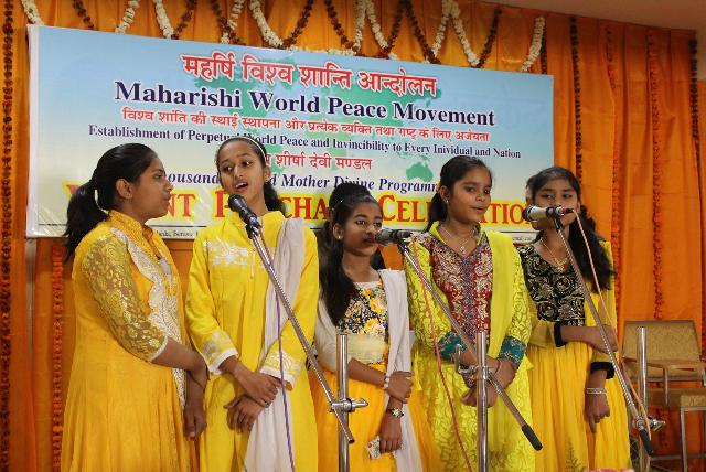 Students participating in group song competition