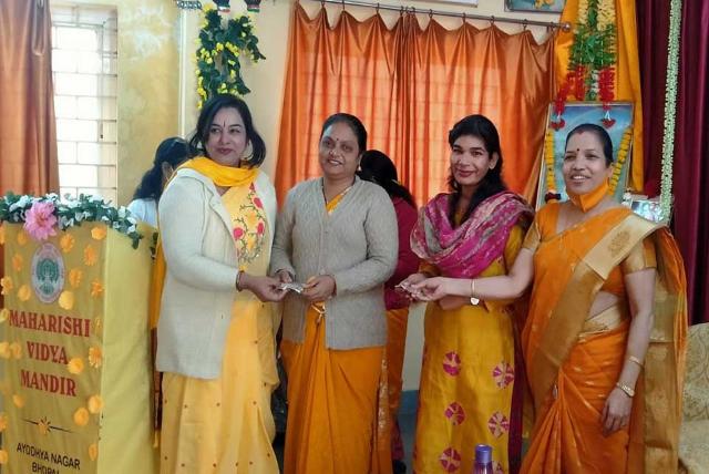 Sahasrasheersha Devi Mandal, female wing of Maharishi World Peace Movement celebrated Vasant Panchami at Maharishi Vidya Mandir, Ayodhya Nagar, Bhopal today with various activities.<br><br>Celebration started with the Guru Pujan followed by Saraswati Pooja and Group meditation. Smt.Suman Yadav, Secretary, Ayodya Nagar, Bhopal welcomed everyone present there.<br><br>On this occasion, Smt. Arya Nandkumar, National Secretary - Communication in her address briefed about Vasant Panchami and the importance of Saraswati Pooja. She further added that this day is auspicious for Sikhs due to the marriage of their Guru taken place on Vasant Panchami day. So there is no need to see any muhurth etc for doing any noble things. Smt.Suman Yadav, Principal, Maharishi Vidya Mandir, Ayodhya Nagar, Bhopal in her speech conveyed that Goddess Saraswati, the Goddess of knowledge and music is worshipped on the day of Vasant Panchami. We all should worship Saraswati Ji regularly so that we can get continuous knowledge. There were games namely