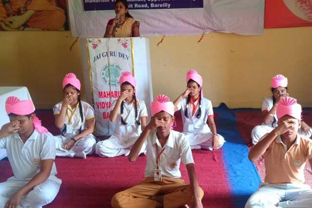   World Peace Day was celebrated today at Maharishi Vidya Mandir Bareilly UP. Programme was started with Shri Guru Parampara Pujan followed by Pranayam and group practice of TM.
     Principal R.L.Singh explained contribution of His Holiness Maharishi Mahesh Yogi Ji in establishing world Peace. 
      On this occasion Maharishi Peace Volunteers along with students and staff members taken oath to contribute their effort to establish peace by practicing TM daily.