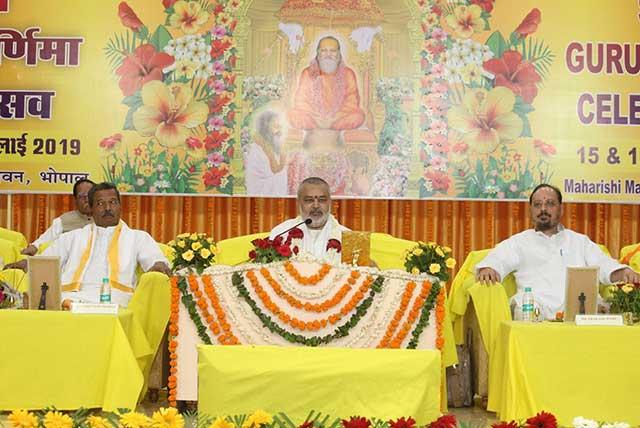 Brahmachari Girish Ji addressing the audience on the auspicious occasion of Shri Guru Purnima Celebration on 15th July 2019 at Maharishi Vidya Mandir Ratanpur Campus Bhopal. Brahmchari Girish offered all the acheivements of Maharishi organisations to the lotus feet of Shri Gurudev. 
