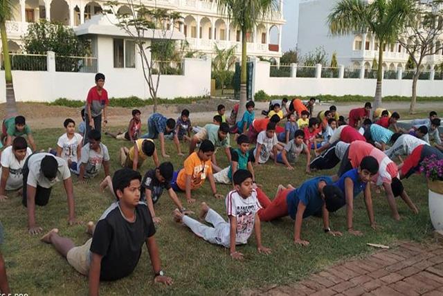 Peace Assembly participants performing Surya Namaskar.