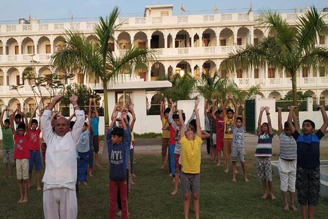 Peace Assembly participants performing Surya Namaskar.